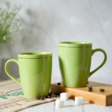 Femora Premium Gold Line Green Ceramic Coffee Mug(320 Ml, Pack Of 2)